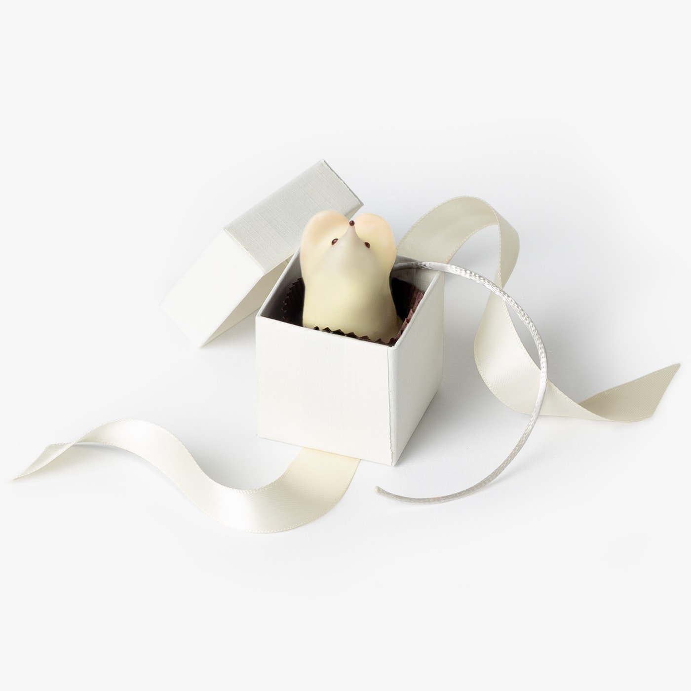 Single white chocolate mouse packaged in a gift box, ready for your next wedding or event.